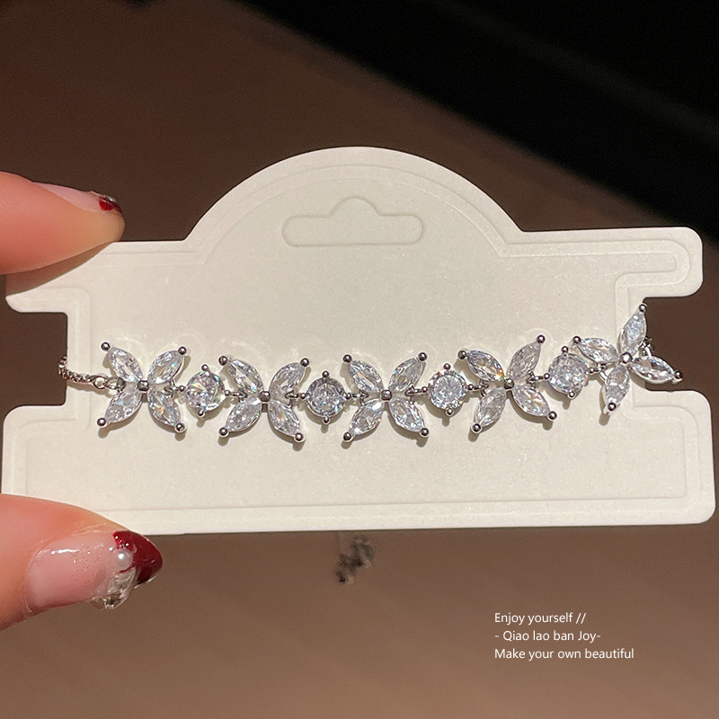 Lắc tay cỏ 4 lá đá zircon rút freesize thiết kế màu bạc cao cấp B1991