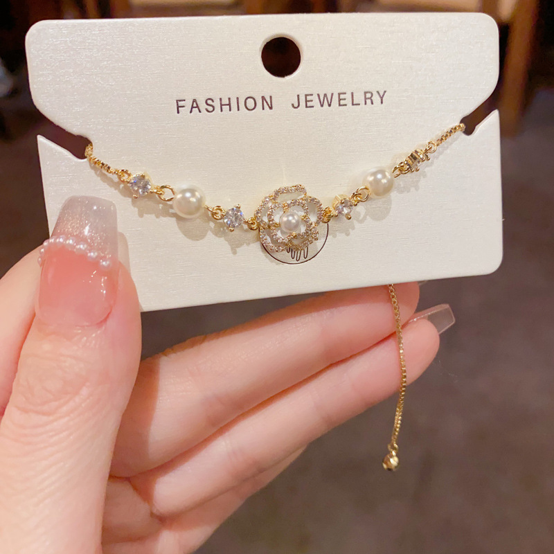 Lắc tay nữ HOA TRÀ trắng nhụy ngọc rút chỉnh FREESIZE thiết kế Hàn quốc xi vàng pha cao cấp độc đáo, quà tặng xinh ý nghĩa B4523