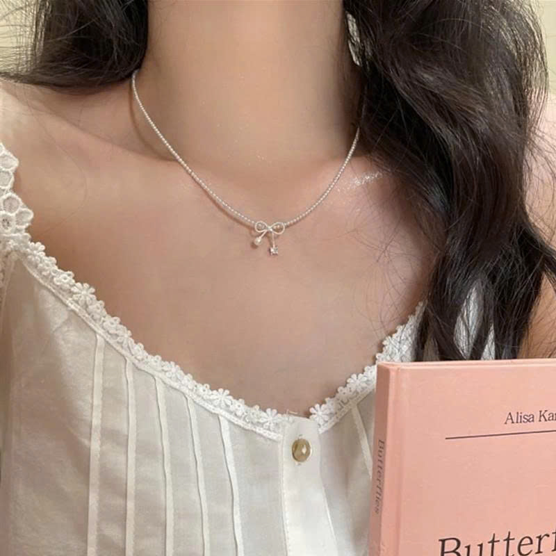 Dây chuyền nữ đi tiệc độc đáo, dây chuyền cô dâu ngọc nhí NƠ màu bạc, phụ kiên dây chuyền cưới B5152